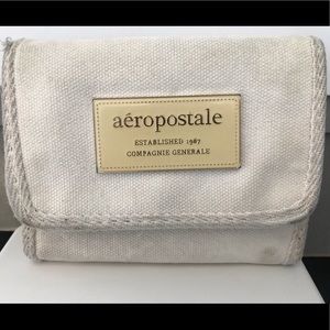 Aeropostale white canvas wallet with logo plate